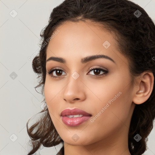 Joyful latino young-adult female with long  brown hair and brown eyes