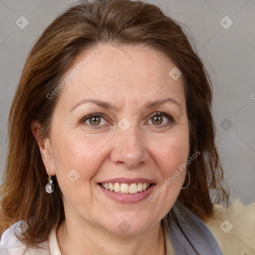 Joyful white adult female with medium  brown hair and brown eyes