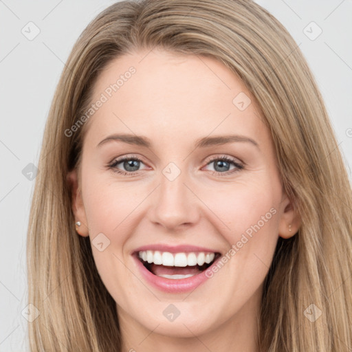 Joyful white young-adult female with long  brown hair and grey eyes