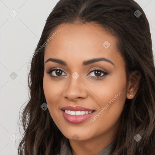 Joyful latino young-adult female with long  brown hair and brown eyes