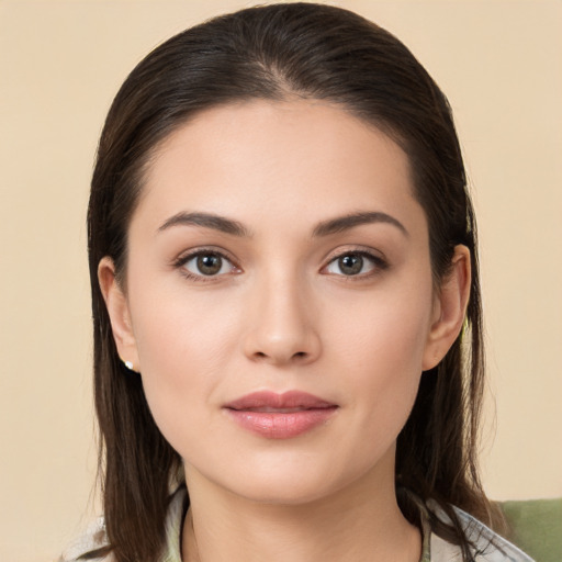 Neutral white young-adult female with medium  brown hair and brown eyes