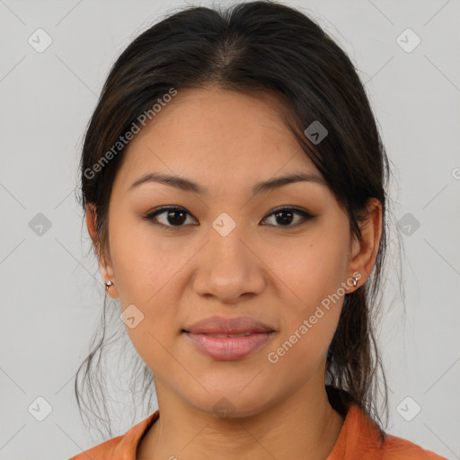 Joyful latino young-adult female with medium  brown hair and brown eyes