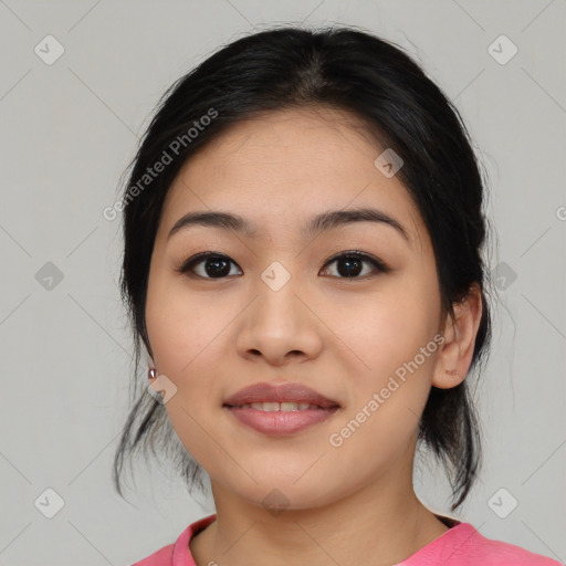 Joyful asian young-adult female with medium  black hair and brown eyes