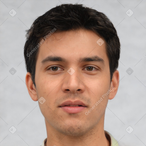 Neutral asian young-adult male with short  brown hair and brown eyes