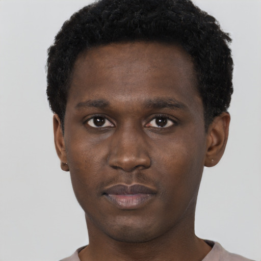 Neutral black young-adult male with short  brown hair and brown eyes