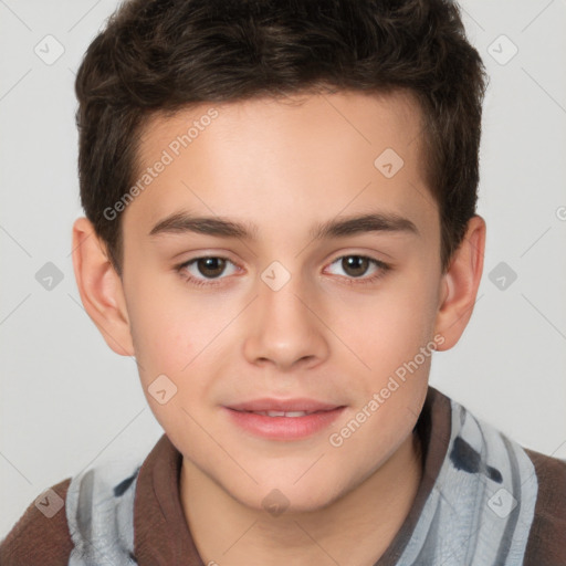 Joyful white child male with short  brown hair and brown eyes