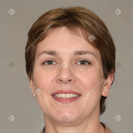 Joyful white adult female with short  brown hair and grey eyes