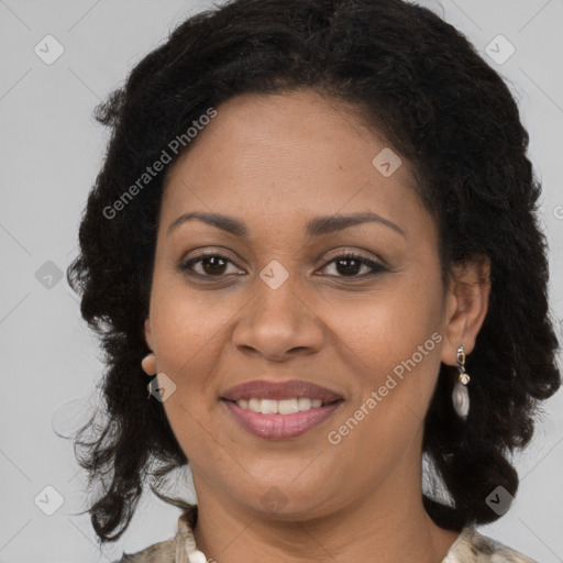 Joyful black young-adult female with long  brown hair and brown eyes