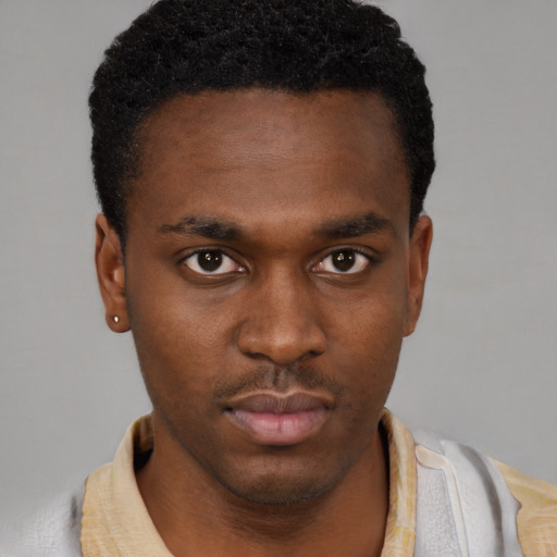 Neutral black young-adult male with short  brown hair and brown eyes