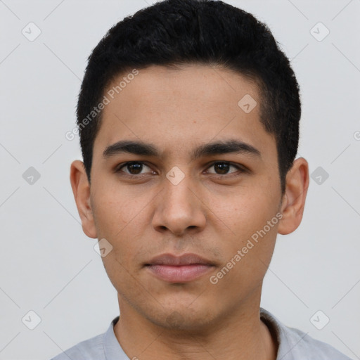 Neutral latino young-adult male with short  black hair and brown eyes