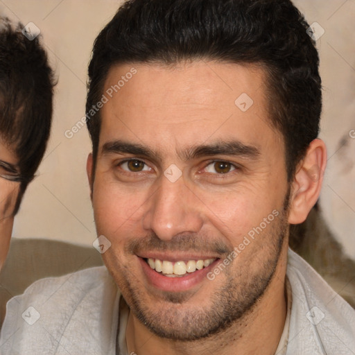 Joyful white young-adult male with short  brown hair and brown eyes