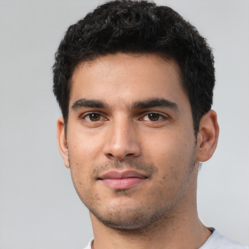 Neutral white young-adult male with short  black hair and brown eyes