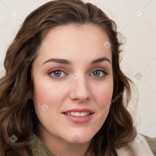 Joyful white young-adult female with long  brown hair and green eyes