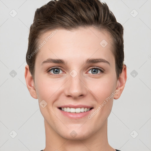 Joyful white young-adult female with short  brown hair and grey eyes