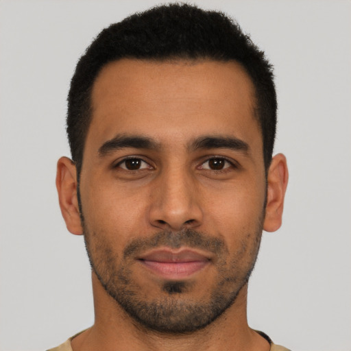 Neutral latino young-adult male with short  black hair and brown eyes