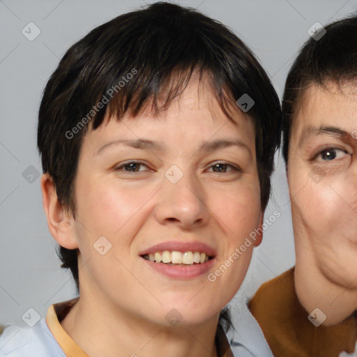 Joyful white adult female with medium  brown hair and brown eyes