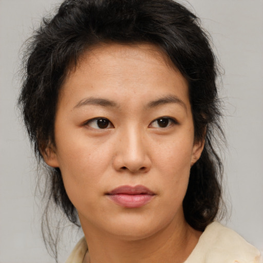 Neutral asian young-adult female with medium  brown hair and brown eyes