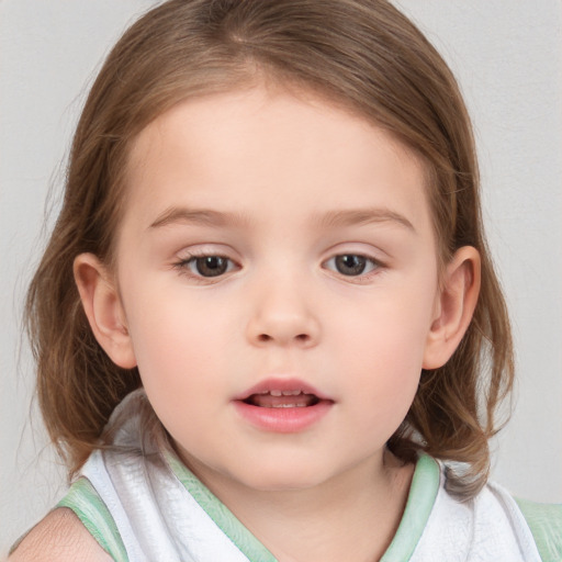 Neutral white child female with medium  brown hair and blue eyes