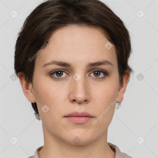 Neutral white young-adult female with short  brown hair and brown eyes