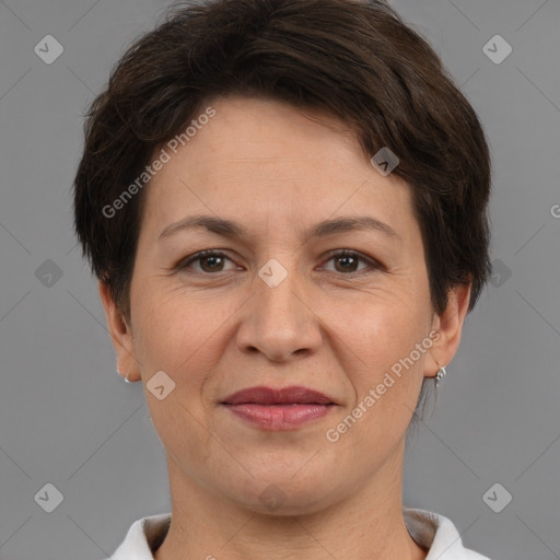 Joyful white adult female with short  brown hair and brown eyes