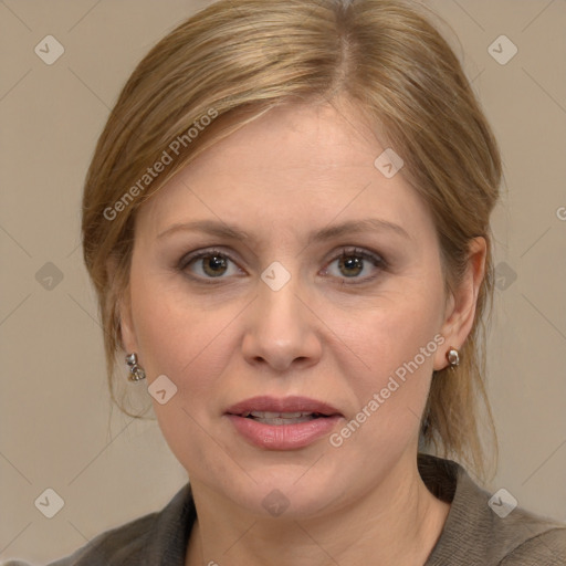 Joyful white adult female with medium  brown hair and grey eyes