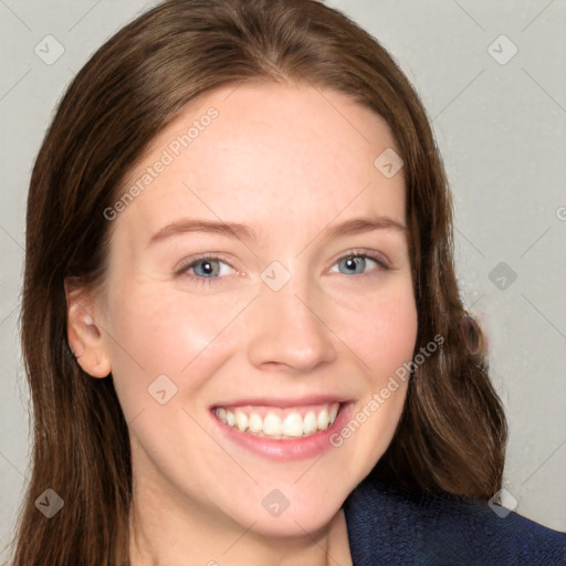 Joyful white young-adult female with long  brown hair and blue eyes