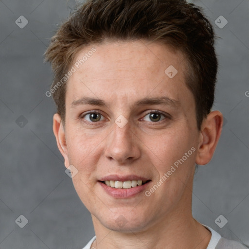 Joyful white adult female with short  brown hair and grey eyes