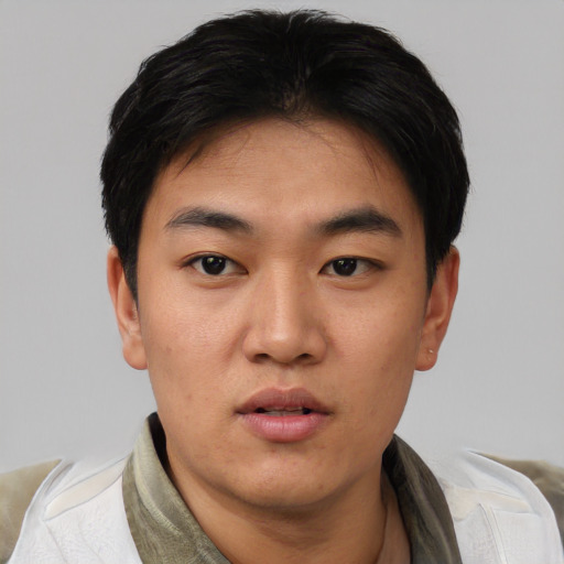 Neutral asian young-adult male with short  black hair and brown eyes