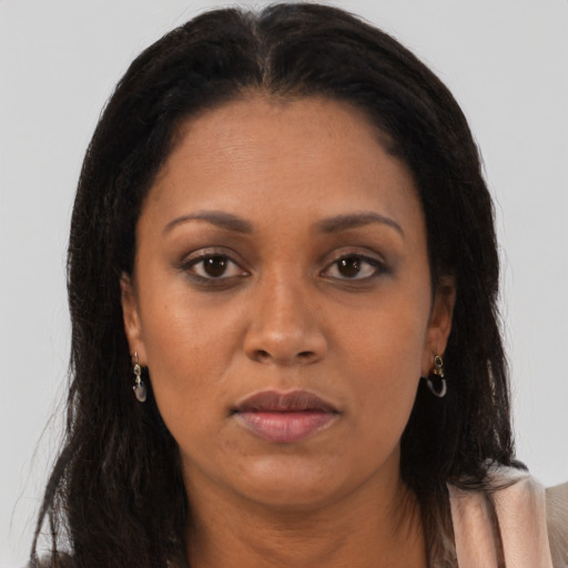 Neutral black adult female with long  brown hair and brown eyes