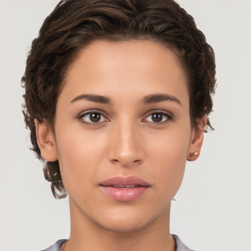 Neutral white young-adult female with short  brown hair and brown eyes