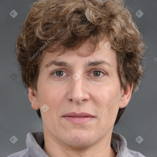 Joyful white adult male with short  brown hair and grey eyes