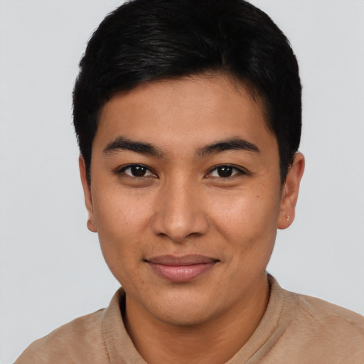 Joyful asian young-adult female with short  black hair and brown eyes