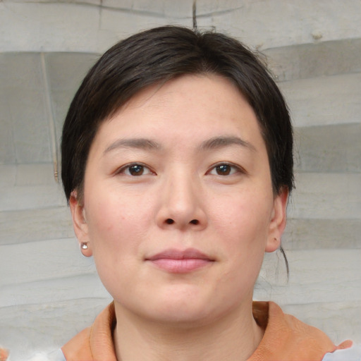 Neutral white young-adult female with short  brown hair and brown eyes
