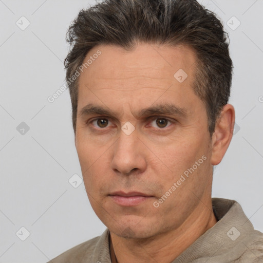 Neutral white adult male with short  brown hair and brown eyes