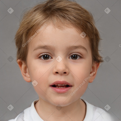 Joyful white child male with short  brown hair and brown eyes