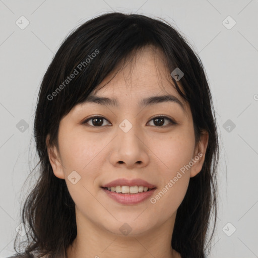 Joyful asian young-adult female with long  brown hair and brown eyes