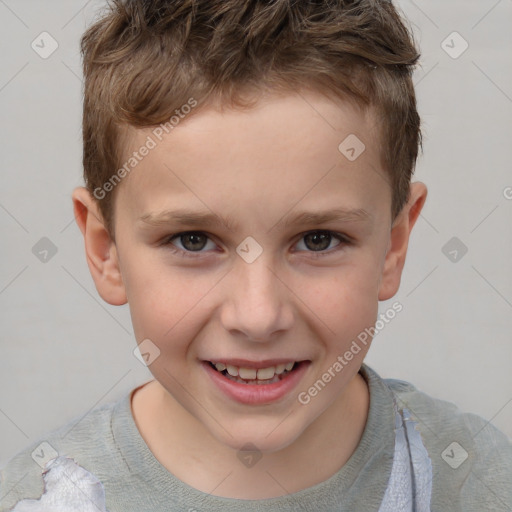 Joyful white child male with short  brown hair and brown eyes