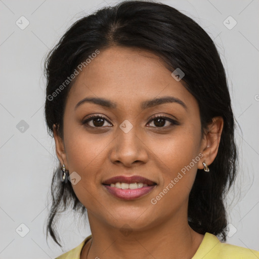 Joyful latino young-adult female with medium  brown hair and brown eyes