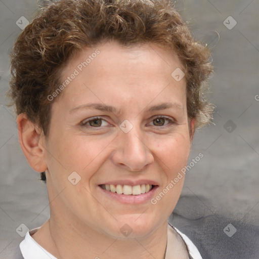 Joyful white adult female with short  brown hair and grey eyes