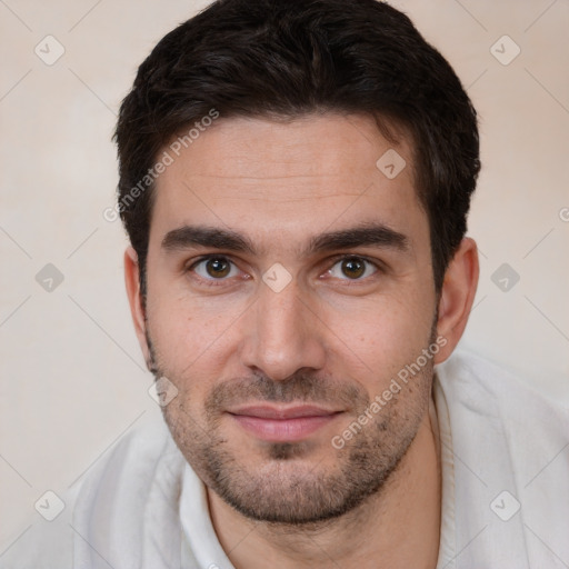 Joyful white young-adult male with short  brown hair and brown eyes