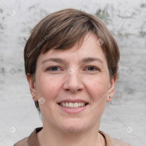 Joyful white young-adult female with short  brown hair and grey eyes