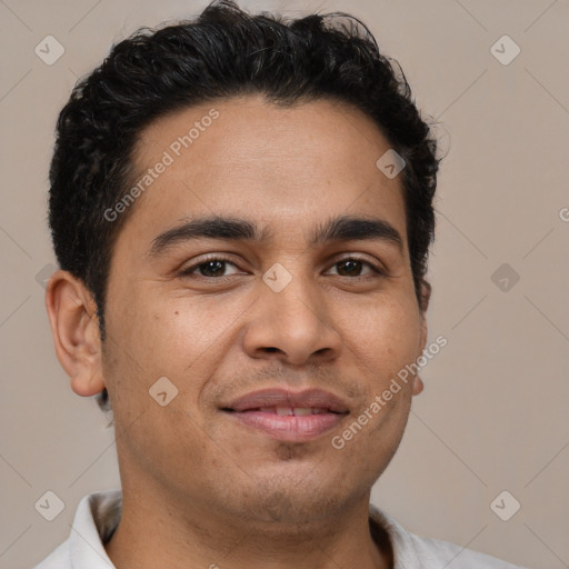 Joyful latino young-adult male with short  brown hair and brown eyes