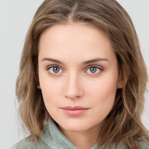 Neutral white young-adult female with medium  brown hair and green eyes