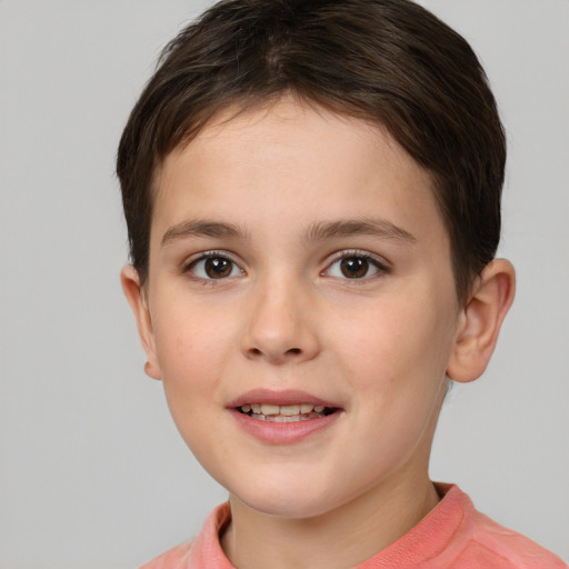 Joyful white child female with short  brown hair and brown eyes