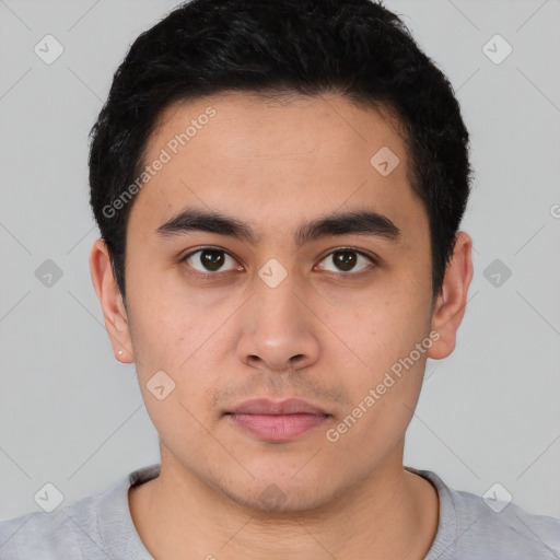 Neutral latino young-adult male with short  black hair and brown eyes