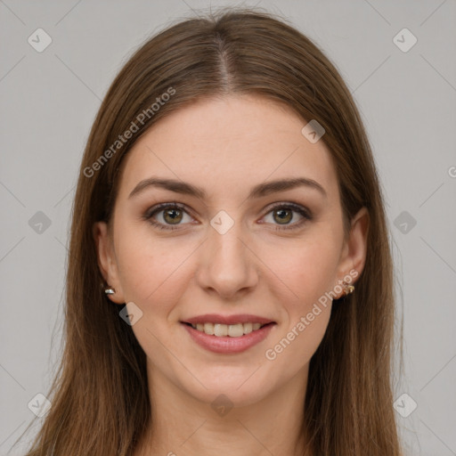 Joyful white young-adult female with long  brown hair and green eyes