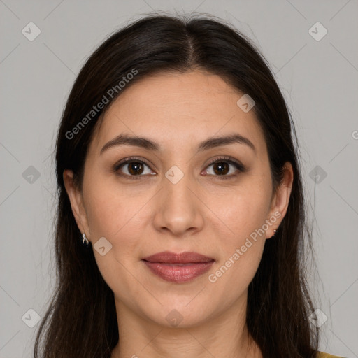 Joyful white young-adult female with long  brown hair and brown eyes