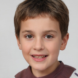 Joyful white child male with short  brown hair and brown eyes