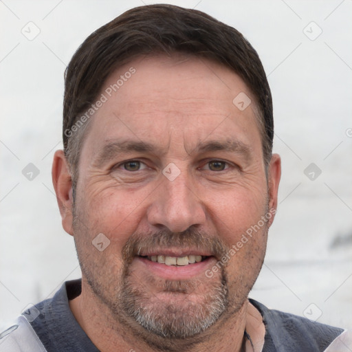 Joyful white adult male with short  brown hair and grey eyes