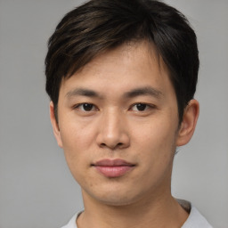 Neutral asian young-adult male with short  brown hair and brown eyes